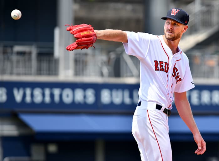Boston Red Sox ace Chris Sale receives a throw back from the catcher while pitching a simulated inning Thursday at Polar Park.  